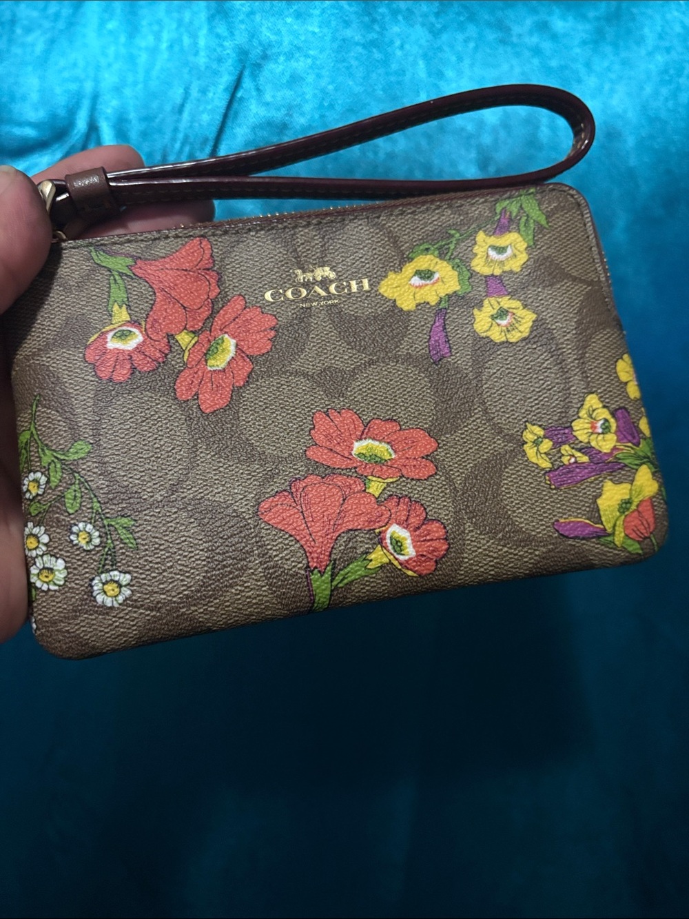 COACH Brown Floral Signature Wristlet with Red & Yellow Blooms